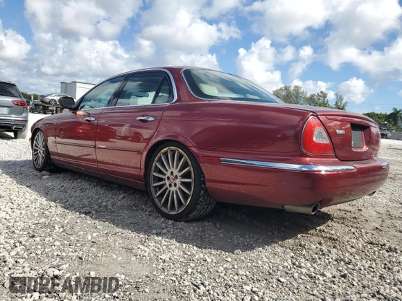 2004 Jaguar XJ R z VIN SAJWA73B84TG19080, wystawiony jako Copart lot #45059985 z przebiegiem 118 477 mil mil oraz Czysty tytuł • Clean title. Historia ofert i sprzedaży dostępna na DreamBid. Obrazek 2.