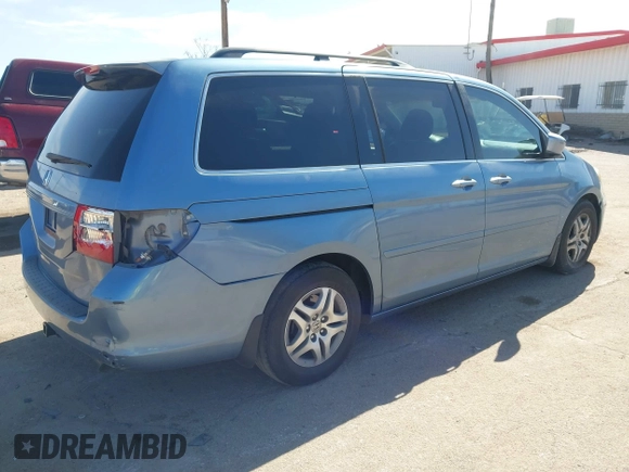 2006 Honda Odyssey EX-L with VIN 5FNRL38796B099851, listed as a IAAI auction lot 41555109 with 154,707 mi miles and . Bid and sale history available at DreamBid. Image 4.