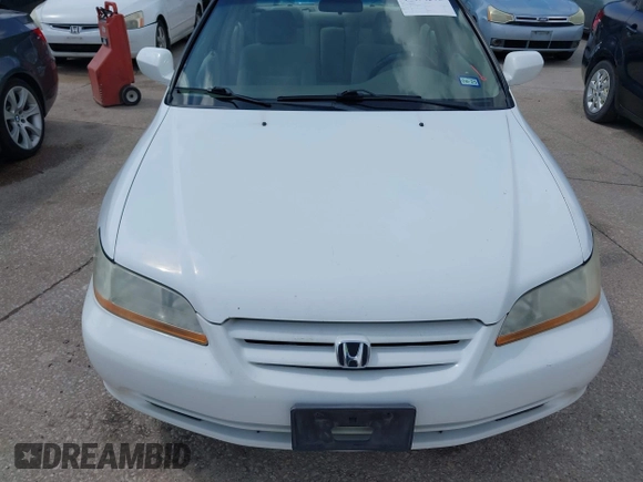 2002 Honda Accord LX z VIN 1HGCG56482A067556, wystawiony jako IAAI lot #42494292 z przebiegiem 209 511 mil mil oraz . Historia ofert i sprzedaży dostępna na DreamBid. Obrazek 6.