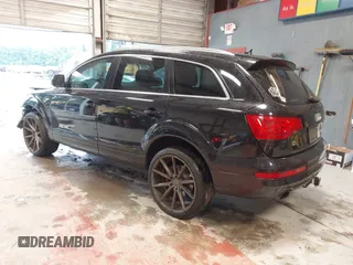 2014 Audi Q7 Premium Plus with VIN WA1LGAFE7ED003294, listed as a IAAI auction lot 42318454 with 113,719 mi miles and . Bid and sale history available at DreamBid. Image 3.