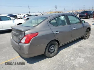 2016 Nissan Versa S with VIN 3N1CN7AP0GL803412, listed as a Copart auction lot 64677645 with 96,788 mi miles and Salvage title. Bid and sale history available at DreamBid. Image 3.