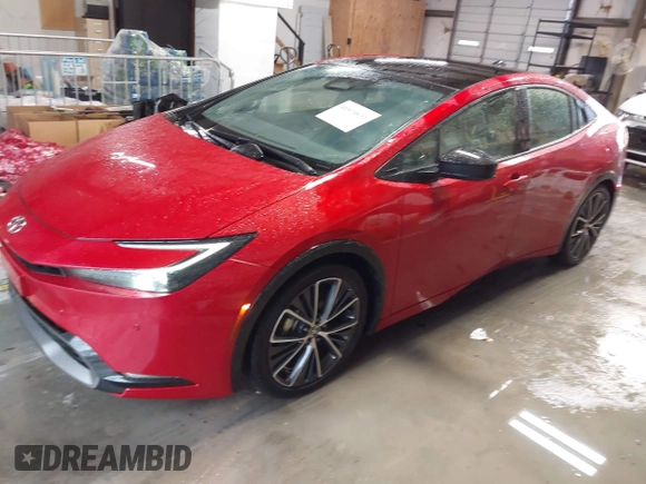 2024 Toyota Prius LE with VIN JTDACAAUXR3039886, listed as a IAAI auction lot 41928633 with 1,468 mi miles and . Bid and sale history available at DreamBid. Image 2.