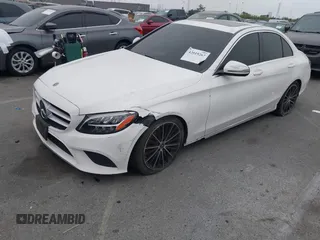 2019 Mercedes-Benz C 300 with VIN 55SWF8DB0KU290584, listed as a IAAI auction lot 42019267 with 88,717 mi miles and . Bid and sale history available at DreamBid. Image 2.