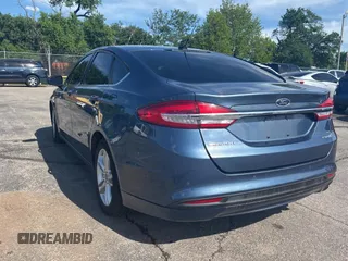 2018 Ford Fusion Hybrid SE with VIN 3FA6P0LU7JR261105, listed as a Copart auction lot 55692065 with 122,782 mi miles and Clean Title. Bid and sale history available at carsss.com. Image 3.