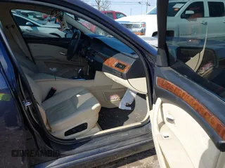 2009 BMW 5 Series 528i with VIN WBANU53559C122165, listed as a IAAI auction lot 41420321 with 148,320 mi miles and . Bid and sale history available at carsss.com. Image 5.