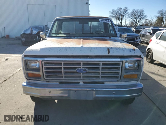 1985 Ford F-150 with VIN 1FTDF15YXFPA97115, listed as a Copart auction lot 87000634 with 28,229 mi miles and Clean Title. Bid and sale history available at carsss.com. Image 5.