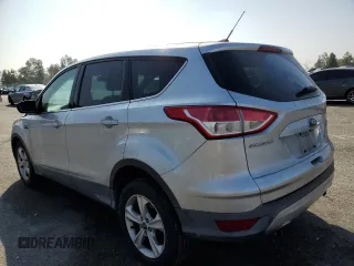 2013 Ford Escape SE with VIN 1FMCU9G91DUA14350, listed as a Copart auction lot 63651315 with 165,414 mi miles and Salvage title. Bid and sale history available at DreamBid. Image 2.