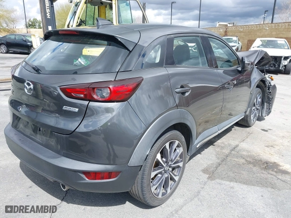 2019 Mazda CX-3 Grand Touring with VIN JM1DKDD71K1445905, listed as a IAAI auction lot 41674243 with 64,949 mi miles. Bid and sale history available at carsss.com. Image 4.