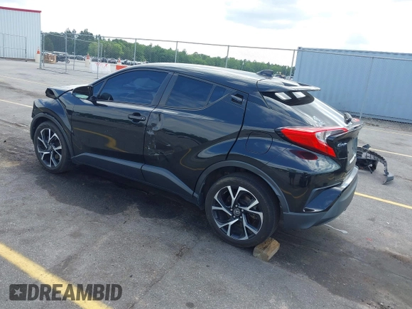 2019 Toyota C-HR XLE with VIN NMTKHMBX4KR096569, listed as a IAAI auction lot 42147017 with 111,569 mi miles and . Bid and sale history available at DreamBid. Image 3.