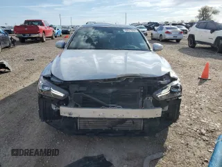 2020 Genesis G70 3.3T with VIN KMTG34LE3LU064052, listed as a Copart auction lot 83573294 with 56,514 mi miles and Salvage Title. Bid and sale history available at DreamBid. Image 5.