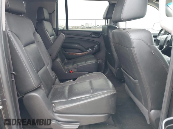2017 Chevrolet Suburban Premier with VIN 1GNSKJKC3HR201180, listed as a IAAI auction lot 41516652 with Not Provided miles and . Bid and sale history available at DreamBid. Image 8.