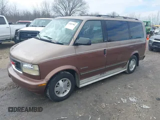 1995 GMC Safari Passenger with VIN 1GKDM19W1SB500991, listed as a IAAI auction lot 41887901 with 210,518 mi miles. Bid and sale history available at carsss.com. Image 2.