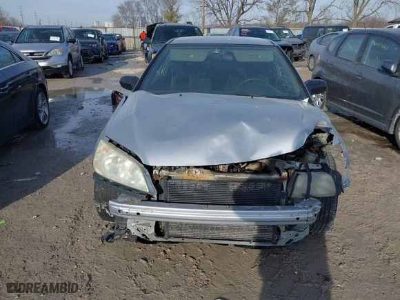 2005 Honda Civic LX with VIN 1HGEM215X5L064781, listed as a IAAI auction lot 41443405 with 303,293 mi miles. Bid and sale history available at carsss.com. Image 6.