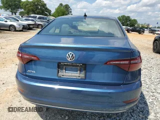 2021 Volkswagen Jetta S z VIN 3VWC57BUXMM001907, wystawiony jako Copart lot #54909405 z przebiegiem 130 101 mil mil oraz Szkoda całkowita • Salvage title. Historia ofert i sprzedaży dostępna na DreamBid. Obrazek 6.