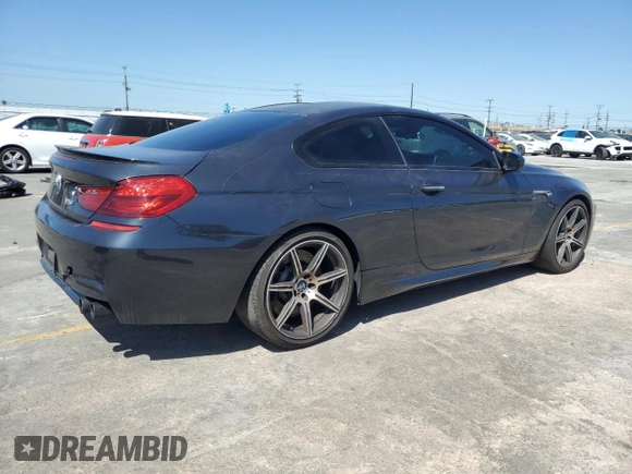 2015 BMW M6 z VIN WBSLX9C58FD160609, wystawiony jako Copart lot #56992535 z przebiegiem 52 324 mil mil oraz Tytuł czysty. Historia ofert i sprzedaży dostępna na DreamBid. Obrazek 3.