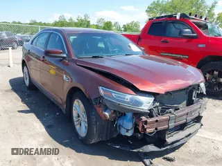 2016 Ford Taurus SEL z VIN 1FAHP2H8XGG136549, wystawiony jako IAAI lot #42338455 z przebiegiem 170 123 mil mil oraz . Historia ofert i sprzedaży dostępna na DreamBid. Obrazek 1.