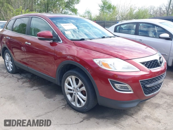 2011 Mazda CX-9 Grand Touring z VIN JM3TB2DA6B0310296, wystawiony jako IAAI lot #42022744 z przebiegiem 163 889 mil mil oraz . Historia ofert i sprzedaży dostępna na DreamBid. Obrazek 1.