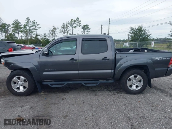 2014 Toyota Tacoma with VIN 5TFLU4EN9EX099414, listed as a IAAI auction lot 40528514 with 122,827 mi miles. Bid and sale history available at carsss.com. Image 13.