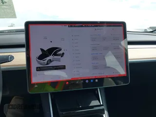 2020 Tesla Model 3 Standard Range Plus z VIN 5YJ3E1EA3LF794276, wystawiony jako IAAI lot #42390409 z przebiegiem 51 924 mil mil oraz . Historia ofert i sprzedaży dostępna na DreamBid. Obrazek 19.