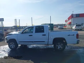 2005 Dodge Dakota SLT with VIN 1D7HW48N85S226460, listed as a IAAI auction lot 41568128 with 213,159 mi miles and . Bid and sale history available at carsss.com. Image 14.
