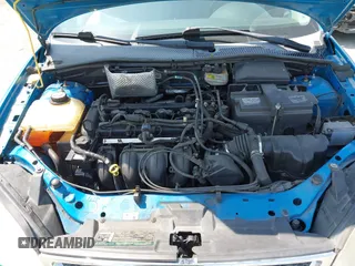 2007 Ford Focus S z VIN 1FAHP34N77W333895, wystawiony jako IAAI lot #42444411 z przebiegiem 155 522 mil mil oraz . Historia ofert i sprzedaży dostępna na DreamBid. Obrazek 10.