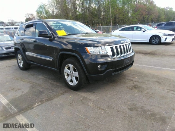 2011 Jeep Grand Cherokee Laredo with VIN 1J4RR4GTXBC538060, listed as a IAAI auction lot 41964694 with 152,999 mi miles. Bid and sale history available at carsss.com. Image 1.