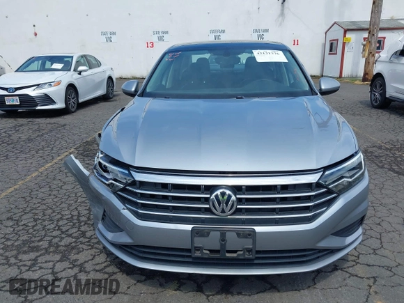 2019 Volkswagen Jetta S with VIN 3VWC57BU2KM215738, listed as a IAAI auction lot 42131376 with 52,720 mi miles and . Bid and sale history available at DreamBid. Image 12.
