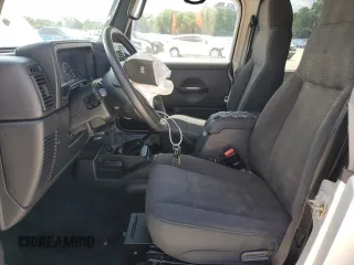 2005 Jeep Wrangler Sport z VIN 1J4FA49S75P324462, wystawiony jako Copart lot #59818995 z przebiegiem 183 558 mil mil oraz Nie do naprawy • Non repairable. Historia ofert i sprzedaży dostępna na DreamBid. Obrazek 7.