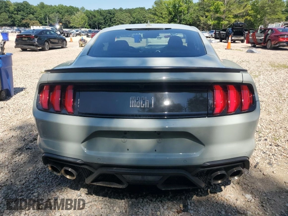 2021 Ford Mustang Mach 1 with VIN 1FA6P8R04M5551165, listed as a Copart auction lot 59977295 with 11,739 mi miles and Salvage title. Bid and sale history available at DreamBid. Image 6.