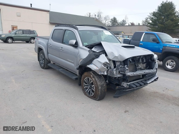 2020 Toyota Tacoma 4WD SR5 with VIN 3TMCZ5AN6LM306311, listed as a IAAI auction lot 41220025 with 67,806 mi miles. Bid and sale history available at carsss.com. Image 1.
