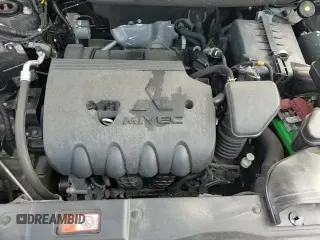 2019 Mitsubishi Outlander SE z VIN JA4AD3A34KZ044966, wystawiony jako Copart lot #80615775 z przebiegiem 80 698 mil mil oraz Szkoda całkowita • Salvage title. Historia ofert i sprzedaży dostępna na DreamBid. Obrazek 14.