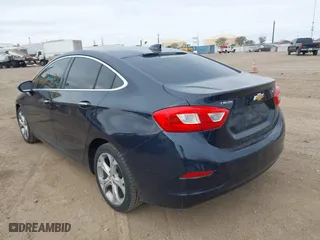 2016 Chevrolet Cruze Premier with VIN 1G1BG5SM1G7250939, listed as a IAAI auction lot 41238704 with 127,872 mi miles. Bid and sale history available at carsss.com. Image 3.
