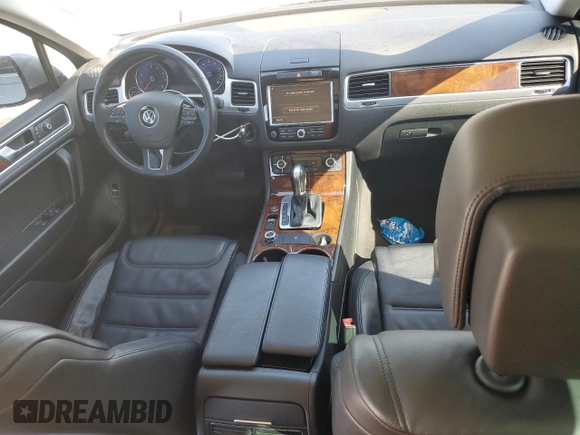2014 Volkswagen Touareg Lux with VIN WVGEF9BP1ED012267, listed as a Copart auction lot 58924055 with 81,009 mi miles and Salvage title. Bid and sale history available at DreamBid. Image 8.