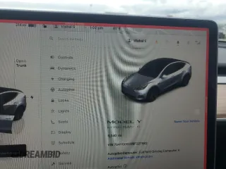 2025 Tesla Model Y Long Range with VIN 7SAYGDED7SF227582, listed as a Copart auction lot 47556595 with 5,340 mi miles and Salvage Title. Bid and sale history available at DreamBid. Image 9.