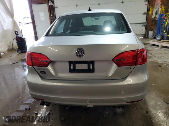 2014 Volkswagen Jetta TDI w/Premium with VIN 3VW3L7AJ3EM310892, listed as a Copart auction lot 61235765 with 242,970 mi miles and Salvage title. Bid and sale history available at DreamBid. Image 6.