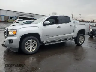 2015 GMC Canyon 4WD SLT with VIN 1GTG6CE35F1251486, listed as a Copart auction lot 46884015 with 162,144 mi miles and Salvage Title. Bid and sale history available at carsss.com. Image 1.