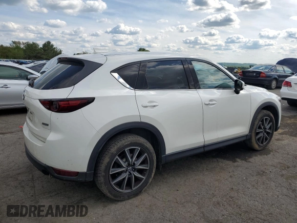2018 Mazda CX-5 Grand Touring z VIN JM3KFBDM6J0447165, wystawiony jako Copart lot #56133015 z przebiegiem 80 579 mil mil oraz Szkoda całkowita • Salvage title. Historia ofert i sprzedaży dostępna na DreamBid. Obrazek 3.