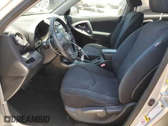 2010 Toyota RAV4 Sport with VIN JTMWF4DVXA5028981, listed as a Copart auction lot 60931165 with 214,075 mi miles and Salvage title. Bid and sale history available at DreamBid. Image 7.