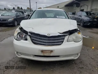 2010 Chrysler Sebring Touring with VIN 1C3CC4FB7AN112467, listed as a Copart auction lot 80875114 with 128,874 mi miles and Salvage Title. Bid and sale history available at carsss.com. Image 5.