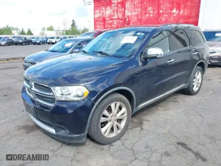 2011 Dodge Durango Crew with VIN 1D4SE4GT4BC593593, listed as a IAAI auction lot 42085058 with 119,578 mi miles. Bid and sale history available at carsss.com. Image 2.