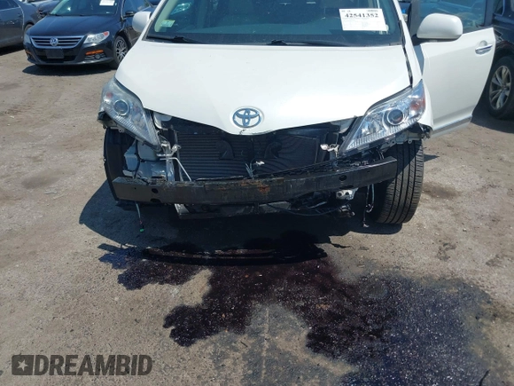 2012 Toyota Sienna XLE with VIN 5TDDK3DC5CS037659, listed as a IAAI auction lot 42541352 with 128,378 mi miles and . Bid and sale history available at DreamBid. Image 6.