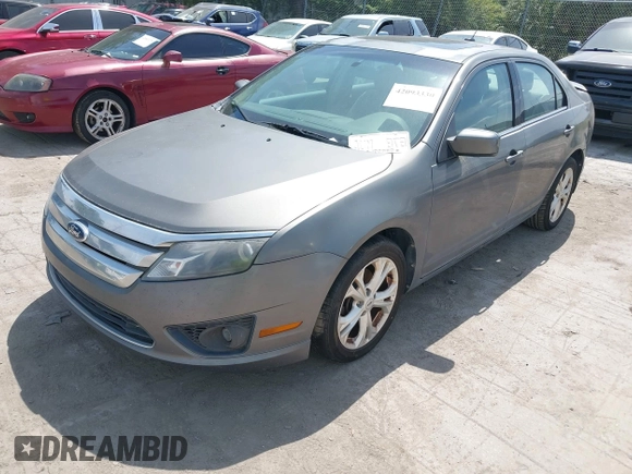 2012 Ford Fusion SE with VIN 3FAHP0HA4CR203446, listed as a IAAI auction lot 42093330 with 185,703 mi miles. Bid and sale history available at carsss.com. Image 2.