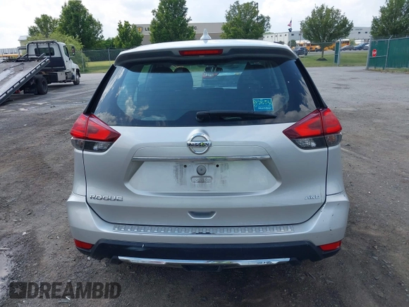 2017 Nissan Rogue SV with VIN 5N1AT2MV5HC798823, listed as a IAAI auction lot 42556631 with 157,721 mi miles and . Bid and sale history available at DreamBid. Image 16.
