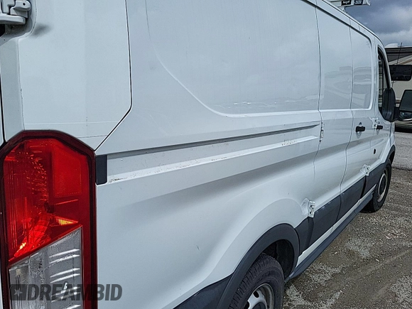 2016 Ford Transit Cargo with VIN 1FTYE1ZM1GKA06047, listed as a IAAI auction lot 42679265 with 124,601 mi miles and . Bid and sale history available at DreamBid. Image 27.