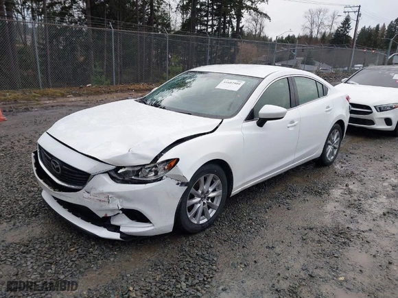 2016 Mazda Mazda6 i Sport with VIN JM1GJ1U52G1431967, listed as a IAAI auction lot 41602804 with 130,579 mi miles. Bid and sale history available at carsss.com. Image 2.
