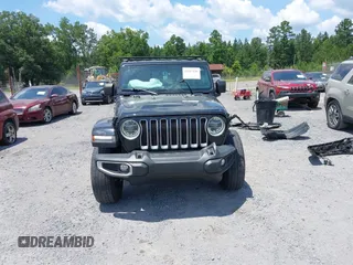 2021 Jeep Wrangler Unlimited Sahara with VIN 1C4HJXEN9MW681422, listed as a IAAI auction lot 42563426 with 48,582 mi miles and . Bid and sale history available at DreamBid. Image 12.