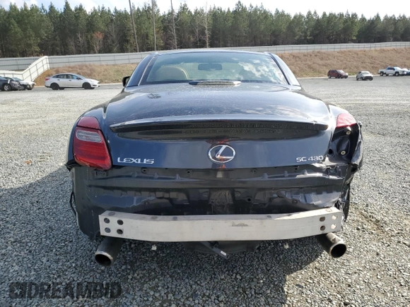 2009 Lexus SC 430 with VIN JTHFN45Y299020985, listed as a Copart auction lot 50300685 with 74,285 mi miles and Salvage Title. Bid and sale history available at DreamBid. Image 6.
