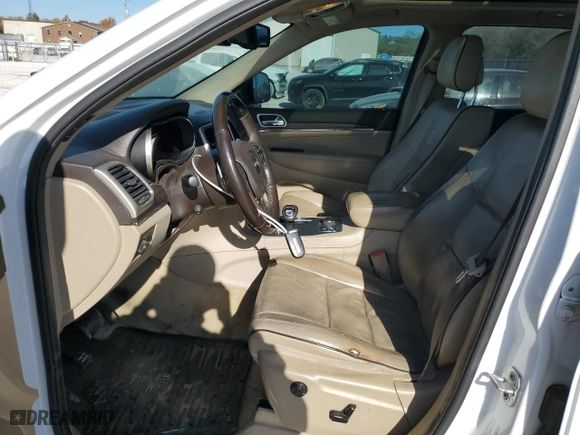 2014 Jeep Grand Cherokee Overland with VIN 1C4RJFCT5EC209981, listed as a Copart auction lot 77758524 with 156,270 mi miles and Salvage Title. Bid and sale history available at carsss.com. Image 7.