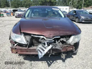 2009 Lincoln MKS z VIN 1LNHM94R89G601127, wystawiony jako Copart lot #60551075 z przebiegiem 102 000 mil mil oraz Szkoda całkowita • Salvage title. Historia ofert i sprzedaży dostępna na DreamBid. Obrazek 5.