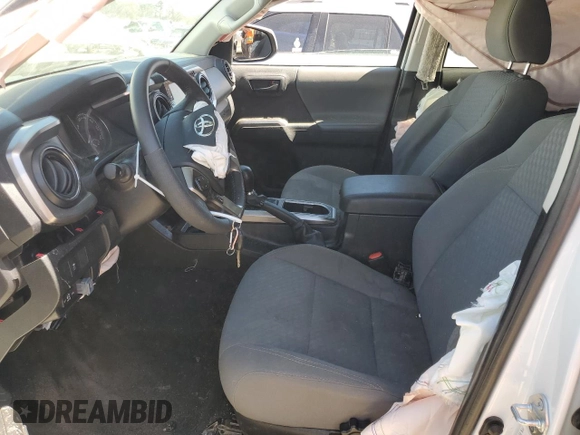 2022 Toyota Tacoma SR with VIN 3TYAX5GN9NT051570, listed as a Copart auction lot 49678735 with 52,709 mi miles and Salvage title. Bid and sale history available at DreamBid. Image 7.